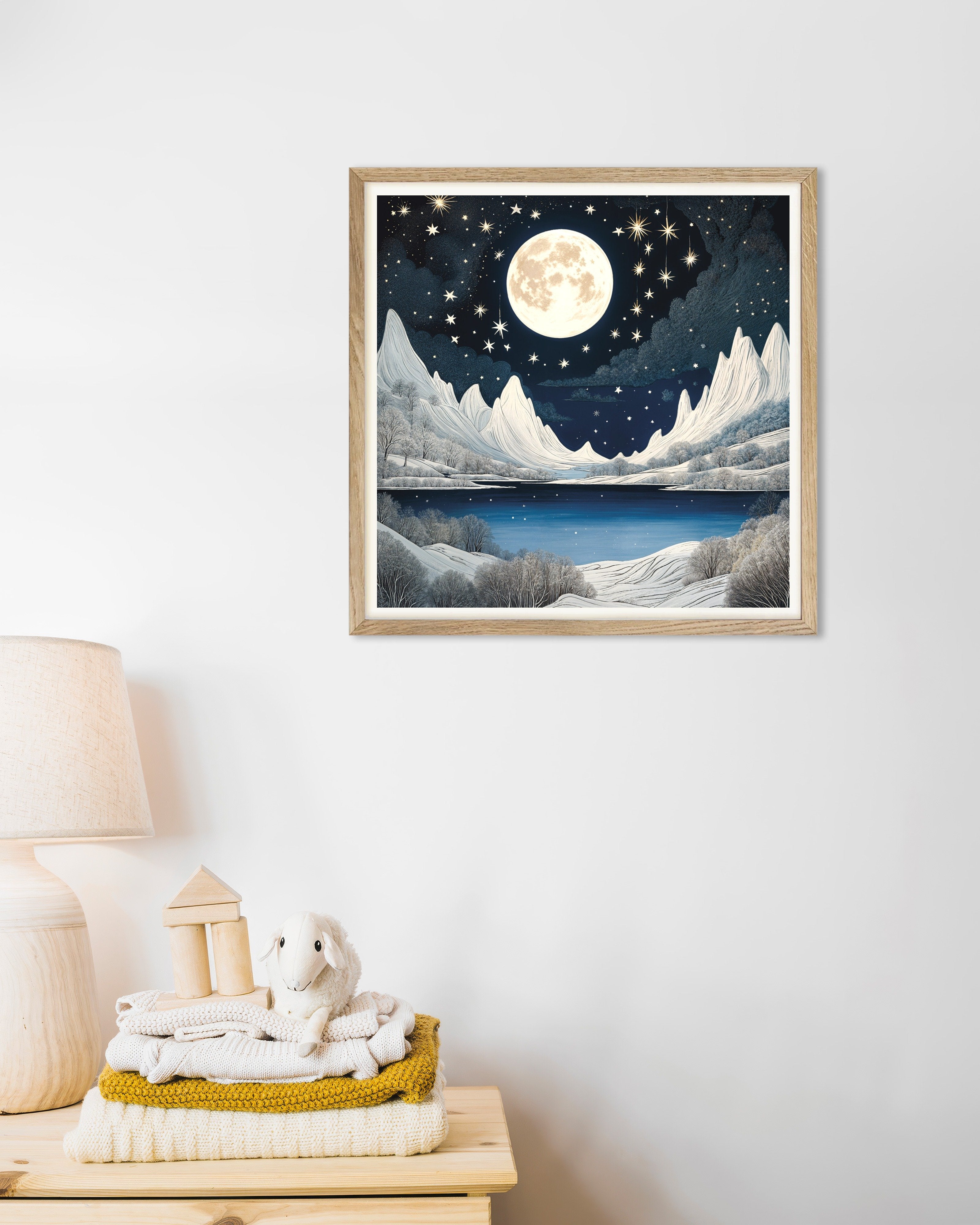 Poster of Moomin inspired winter landscape print, with natural wooden frame