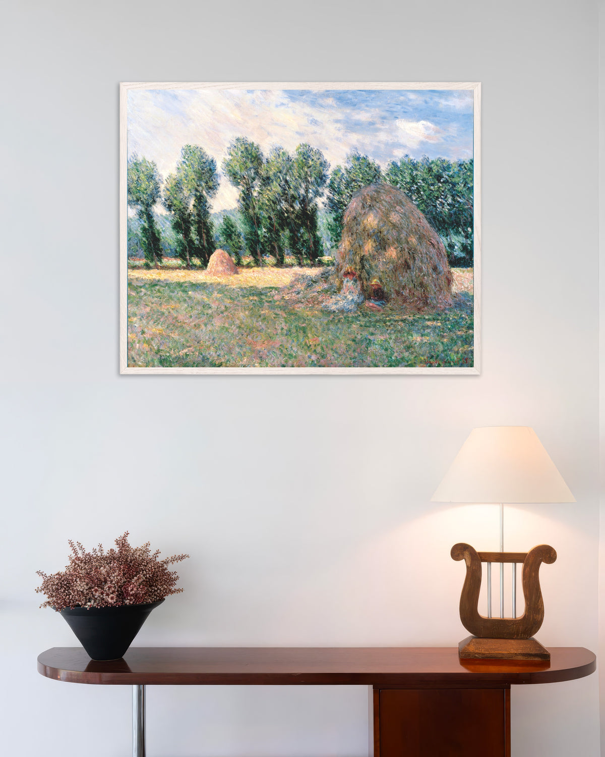 Poster Hooibergen (1885) van Claude Monet met witte houten lijst